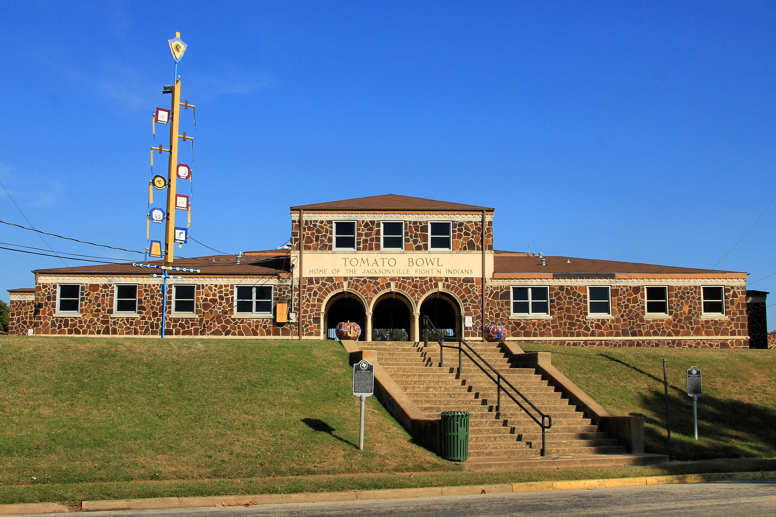 Front exterior of the historic Tomato Bowl stadium in Jacksonville, Texas